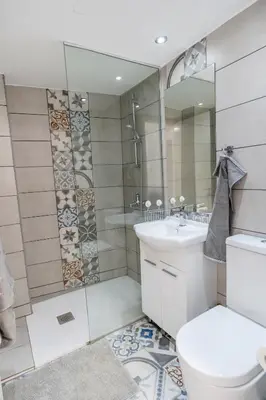 a bathroom with a toilet sink and a mirror at To Hani - Kamara Maisonette in Nicosia