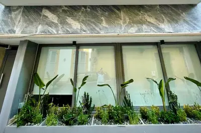 a window sill with plants in it at Irida - Studio Down Town Nicosia in Nicosia