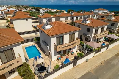 an aerial view of a villa with a swimming pool at Anna-Maria 3 bedroom villa in Paralimni