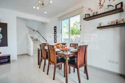 a dining room with a table and chairs at Villa Seaview in Protaras