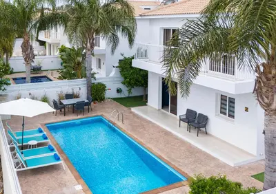 an aerial view of a villa with a swimming pool at LuxVillasRentals Ayia Napa in Ayia Napa