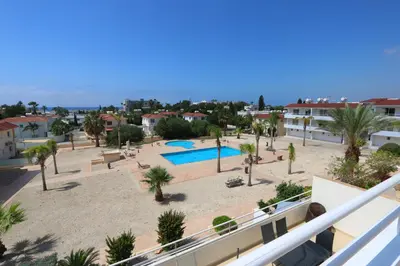 arial view of a resort with a swimming pool at Nissi 3 Amazing Sea View Apartment in Ayia Napa