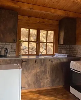 a kitchen with a sink and a window at Bosco Paradiso in Limassol