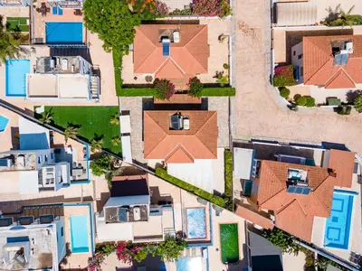an overhead view of houses with roofs at Villa Serena Springs by Ezoria Villas in Protaras