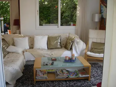 a living room with a couch and a coffee table at Helene Villa in Protaras