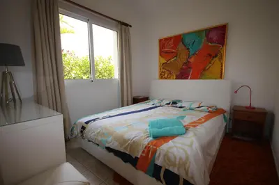 a bedroom with a bed and a window at Helene Villa in Protaras