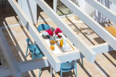an overhead view of a table with flowers on it at Protaras Seafront Villa Violetta in Protaras