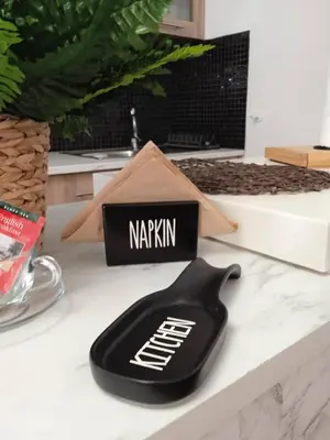 a black appliance sitting on top of a kitchen counter at Adorable Cozy Apartment in Aglantzia