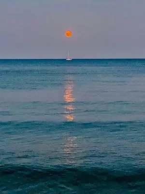 an orange object in the middle of the ocean at BALI SUITES 101 in Larnaka