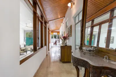 a hallway of a home with a sink and windows at To Hani - Large Traditional House in Nicosia