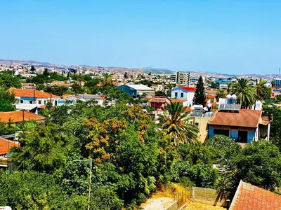 a view of a city with trees and buildings at BALI SUITES 303 in Larnaka
