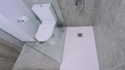 a bathroom with a white toilet and a shower at STAY Melissa Villa in Protaras
