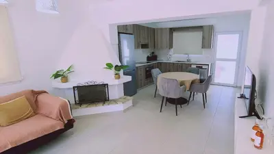 a living room with a couch and a table at STAY Melissa Villa in Protaras