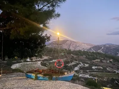 a boat sitting on top of a hill with a light at House on a Hill with Stunning Views near Troodos in Silikou