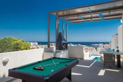 a pool table on the roof of a house at Romeo & Juliet in Protaras