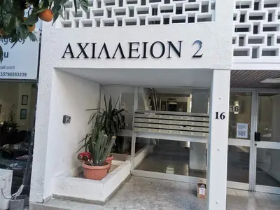 a store front with a sign that reads aktion at Achillion Apartments By 'Flats Nicosia' in Nicosia