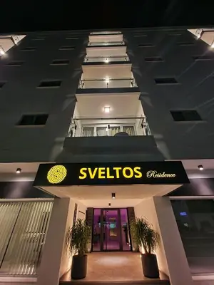 a view of a building with a versos sign on it at Sveltos Residence Suites in Larnaka