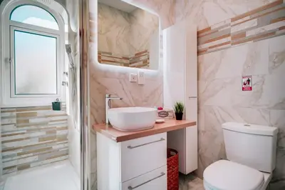 a bathroom with a sink and a toilet at Villa Pant Poly in Protaras
