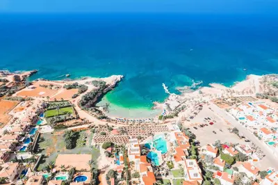 an aerial view of a beach and the ocean at Villa Pant Poly in Protaras