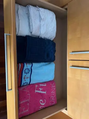 a pile of towels are stacked in a closet at SEA VIEW AMATHUS LUXURY APT in Limassol