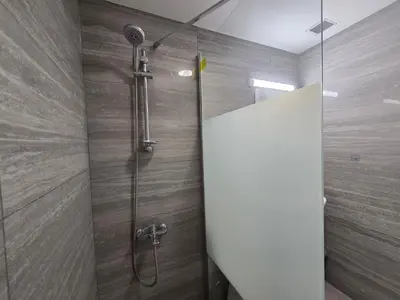 a bathroom with a shower with a glass door at Limassol Star 6 in Limassol
