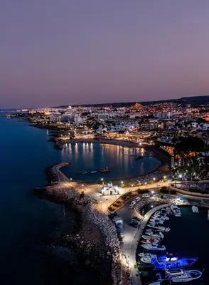 an aerial view of a harbor at night at Villa Lela Serena by Ezoria Villas in Protaras