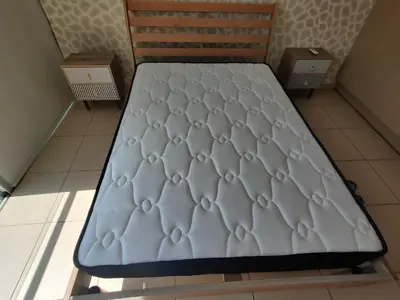 a bed in a room with a mattress on a floor at Dream Vacation by the Sea Protaras in Protaras
