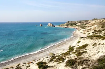 a view of a beach with rocks in the ocean at Maria Villa in Pissouri