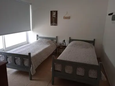 two beds sitting next to each other in a room at Nicosia rest and relax 1 bedroom apartment in Nicosia