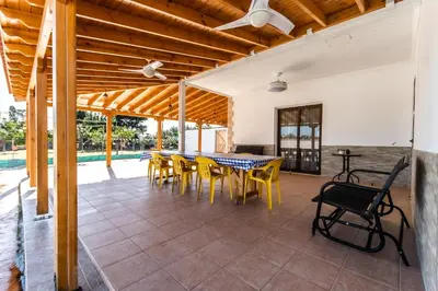 a dining room with a table and chairs at Reel Paradise Villa, Cyprus in Larnaka