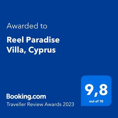 a screenshot of a phone with the text awarded to real paradise villa cyprus at Reel Paradise Villa, Cyprus in Larnaka