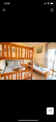 a bedroom with two bunk beds and a window at Villa 4 in Ayia Thekla in Ayia Napa