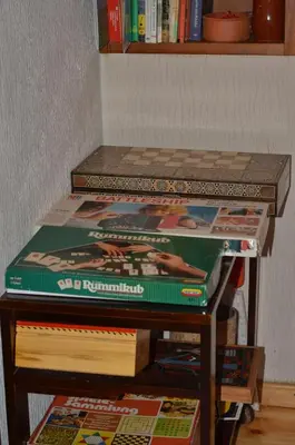 a pile of books sitting on top of a table at IRENE cottage in Kakopetria