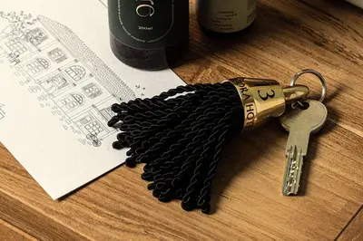 a bunch of rope with a key on a table at The Agora Hotel - Small Luxury Hotel of the World - Adults Only in Pano Lefkara