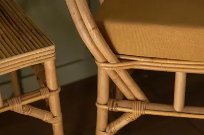 two wooden chairs sitting next to each other at The Agora Hotel - Small Luxury Hotel of the World - Adults Only in Pano Lefkara