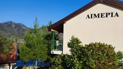 a sign for america on the side of a building at Limeria in Alona