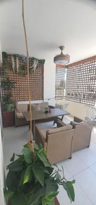 a living room with a table and chairs at STEFARIS 