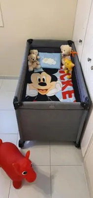 a black suitcase with stuffed animals in it at STEFARIS 