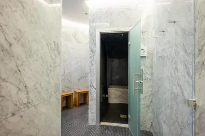 a bathroom with a shower with a glass door at 360 Nicosia - 1 bedroom Luxurious Residence in Nicosia
