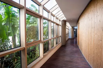 a corridor with windows in a building with trees at 360 Nicosia - 1 bedroom Luxurious Residence in Nicosia