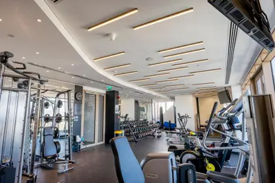 a gym with cardio equipment and treadmills at 360 Nicosia - 1 bedroom Luxurious Residence in Nicosia