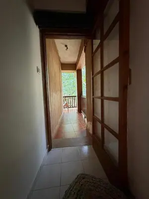 an open door to a room with a balcony at GaliniCafe22-suites in Kakopetria