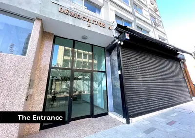 an entrance to a building with a garage at Urban Condo 43 - 1 Bdr in Nicosia