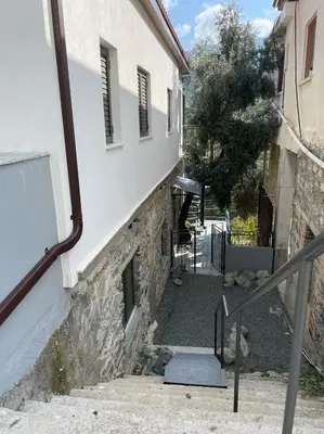 a stairway leading up to a building at Balkoni Moutoullas in Moutoullas