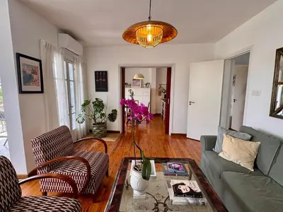 a living room with a couch and chairs and a table at Liberty House - Central Two Bedroom Apartments in Nicosia