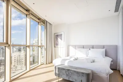 a bedroom with two beds and large windows at 360 Nicosia-3 bedrooms Panoramic Deluxe Residence in Nicosia