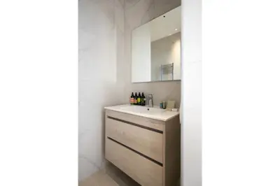 a bathroom with a sink and a mirror at 360 Nicosia-3 bedrooms Panoramic Deluxe Residence in Nicosia
