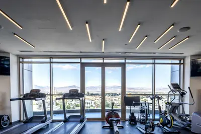 a gym with a view of the city at 360 Nicosia-3 bedrooms Panoramic Deluxe Residence in Nicosia