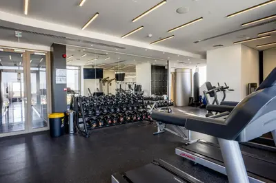 a gym with lots of treadmills and machines at 360 Nicosia-3 bedrooms Exclusive Panoramic View Residence in Nicosia