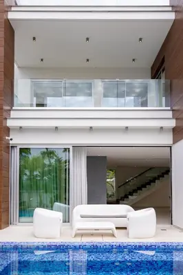 a house with a pool in front of it at Vivo Mare Beachfront Villas - Vista in Ayia Napa